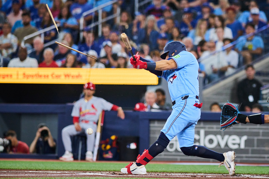 Toronto Blue Jays' Luis Urias breaks his bat on a swing during the first inning of a baseball game against the St. Louis Cardinals in Toronto, Sunday, Aug. 2, 2026. (Sammy Kogan/The Canadian Press via AP)