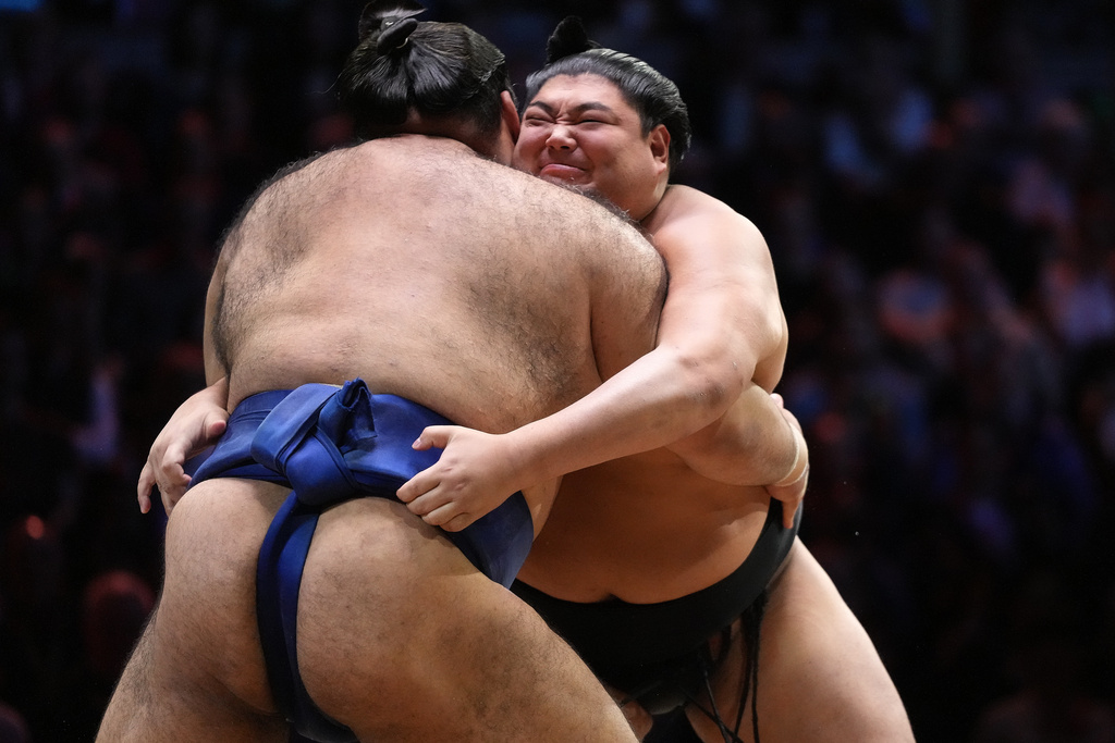 Takayasu, left, and Abi battle during The Grand Sumo Tournament at the Royal Albert Hall in London, Wednesday, Oct. 15, 2025.(AP Photo/Frank Augstein)