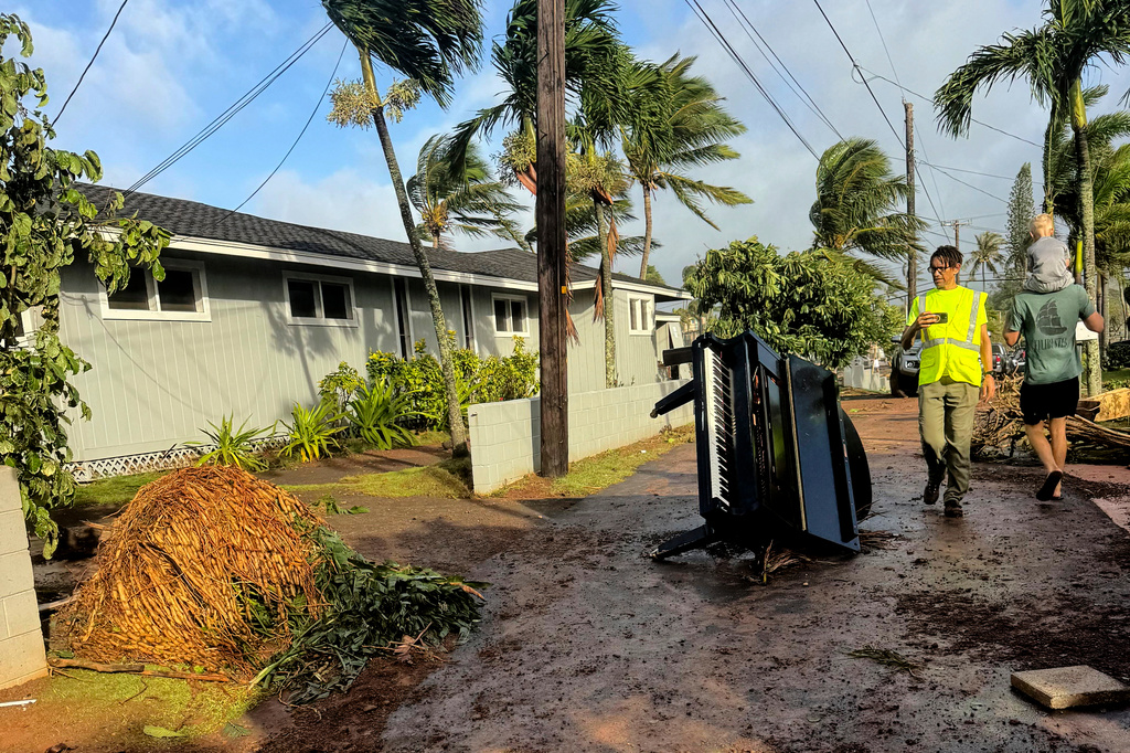 This photo taken by a smartphone, Damage caused by Hurricane Lowell is seen on Tuesday, Sept. 8, 2026 in Poʻipū on Kauaʻi's south shore, in Hawaii. (Guy Miller/Honolulu Civil Beat via AP)