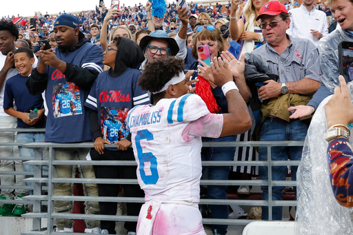Mississippi quarterback Trinidad Chambliss (6) high-fives fans after defeating Oklahoma in an NCAA college football game in Norman, Okla., Saturday, Oct. 25, 2025. (AP Photo/Alonzo Adams) Mississippi quarterback Trinidad Chambliss (6) high-fives fans after defeating Oklahoma in an NCAA college football game in Norman, Okla., Saturday, Oct. 25, 2025. (AP Photo/Alonzo Adams)