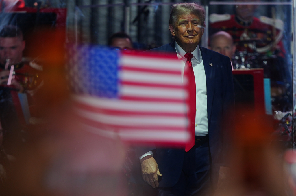 President Donald Trump stands on stage after speaking at the opening of the Great American State Fair on the National Mall, Wednesday, June 24, 2026, in Washington. (AP Photo/Julia Demaree Nikhinson)