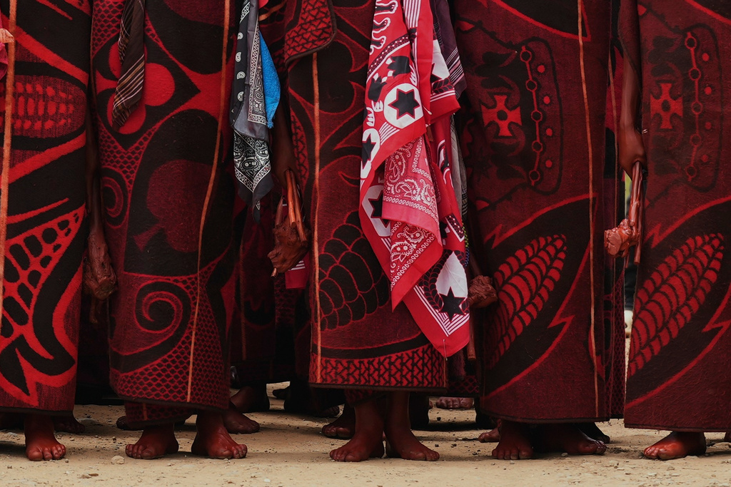 Initiates don traditional garments during an initiation ceremony, in Phuthaditjhaba, South Africa, Saturday, Jan. 3, 2026. (AP Photo/Alfonso Nqunjana)