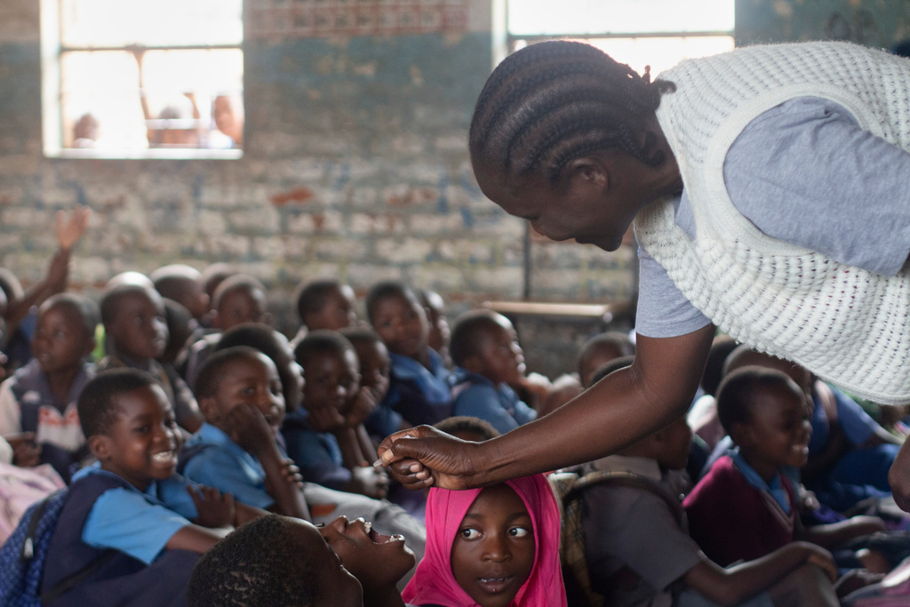 A healthcare worker administers polio vaccine to a child in the Ndirande Township of Blantyre, Malawi, Wednesday, Feb. 11, 2026. (AP Photo/Kenneth Jali)