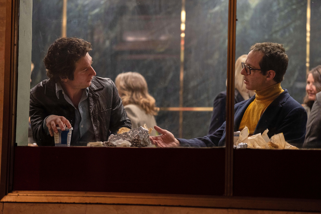 This image released by 20th Century Studios shows Jeremy Allen White as Bruce Springsteen, left, and Jeremy Strong as Jon Landau, in a scene from "Springsteen: Deliver Me From Nowhere." (Macall Polay/20th Century Studios via AP)