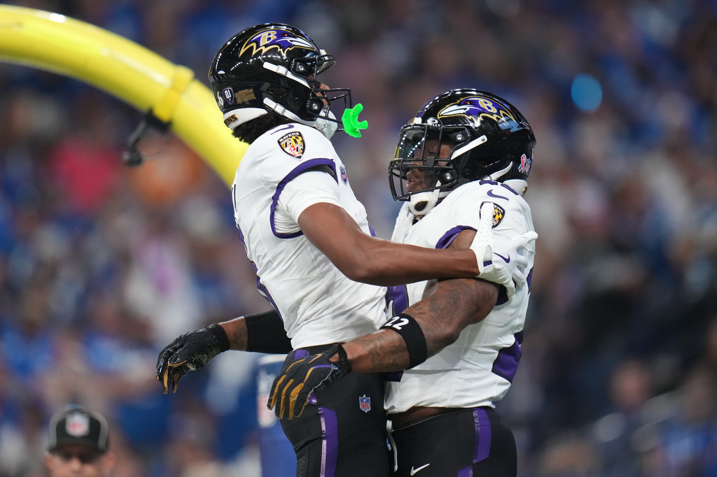 Baltimore Ravens' Derrick Henry celebrates his touchdown run with Ja'kobi Lane during the first half of an NFL football game against the Indianapolis Colts Sunday, Sept. 13, 2026, in Indianapolis. (AP Photo/Jeff Roberson)