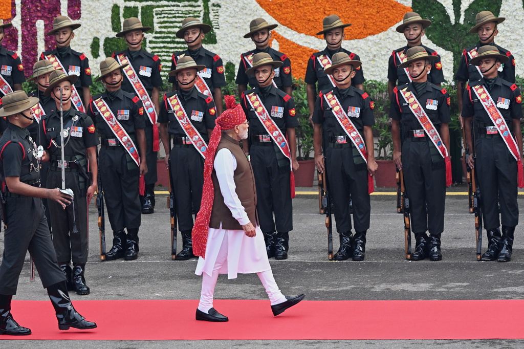 Indian Prime Minister Narendra Modi receives a ceremonial guard of honor as he arrives to address the nation from the rampart of the Red Fort monument during the country's Independence Day celebrations in New Delhi, India, Saturday, Aug. 15, 2026. (AP Photo)