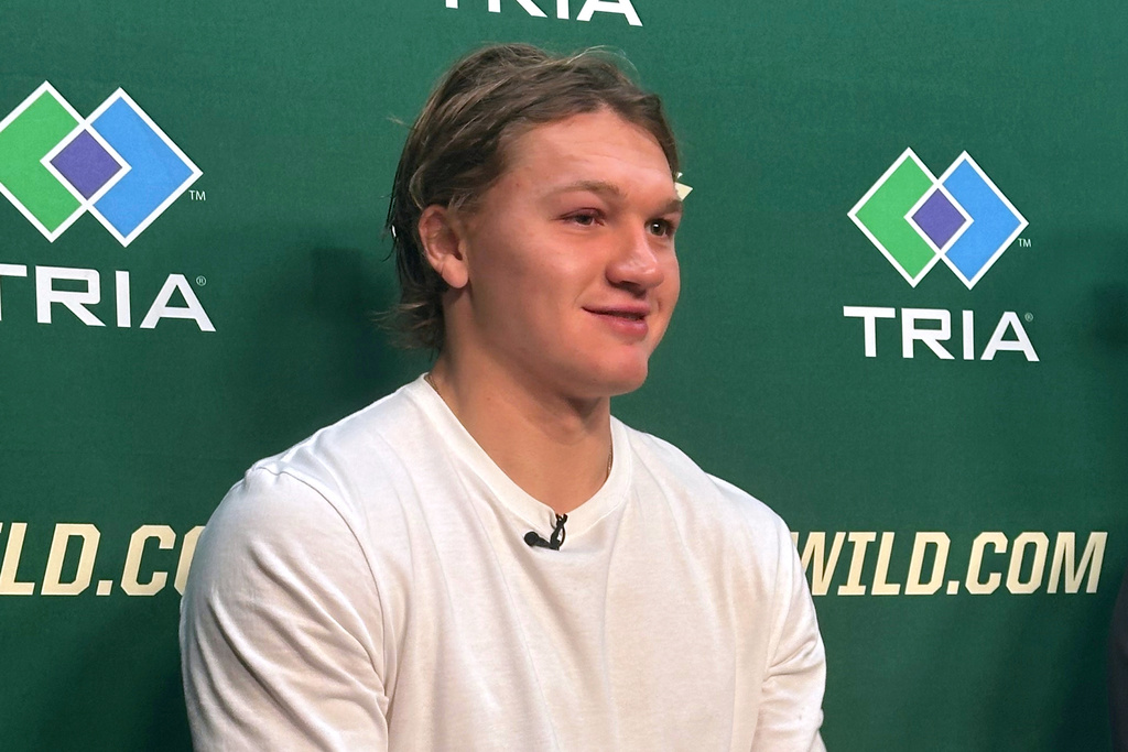 Minnesota Wild left wing Kirill Kaprizov discusses his contract extension during a news conference on Tuesday, Sept. 30, 2025, in St. Paul, Minn. (AP Photo/Dave Campbell)
