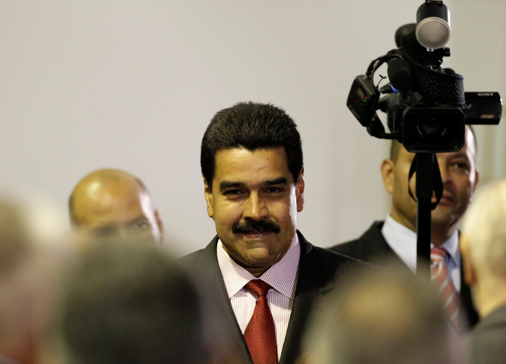 FILE - Venezuela's long time Foreign Minster Nicolas Maduro attends a ceremony declaring President Hugo Chavez official winner of the presidential elections at the Electoral Council in Caracas, Venezuela, Oct. 10, 2012, where Chavez announced he was naming Maduro as his new vice president. (AP Photo/Ariana Cubillos, File)