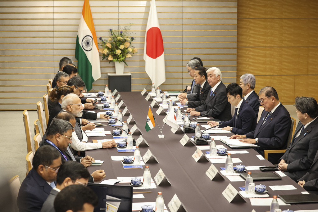 India's Prime Minister Narendra Modi, centre left, listens to Japan's Prime Minister Shigeru Ishiba, centre right, during a meeting in Tokyo, Friday Aug. 29, 2025. (Takashi Aoyama/Pool Photo via AP)