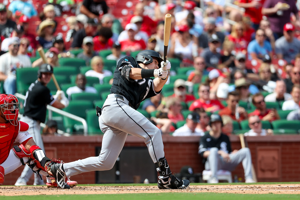 Chicago White Sox's Sam Antonacci follows through for a triple during the sixth inning of a baseball game against the St. Louis Cardinals, Sunday, Sept. 13, 2026, in St. Louis. (AP Photo/Scott Kane)