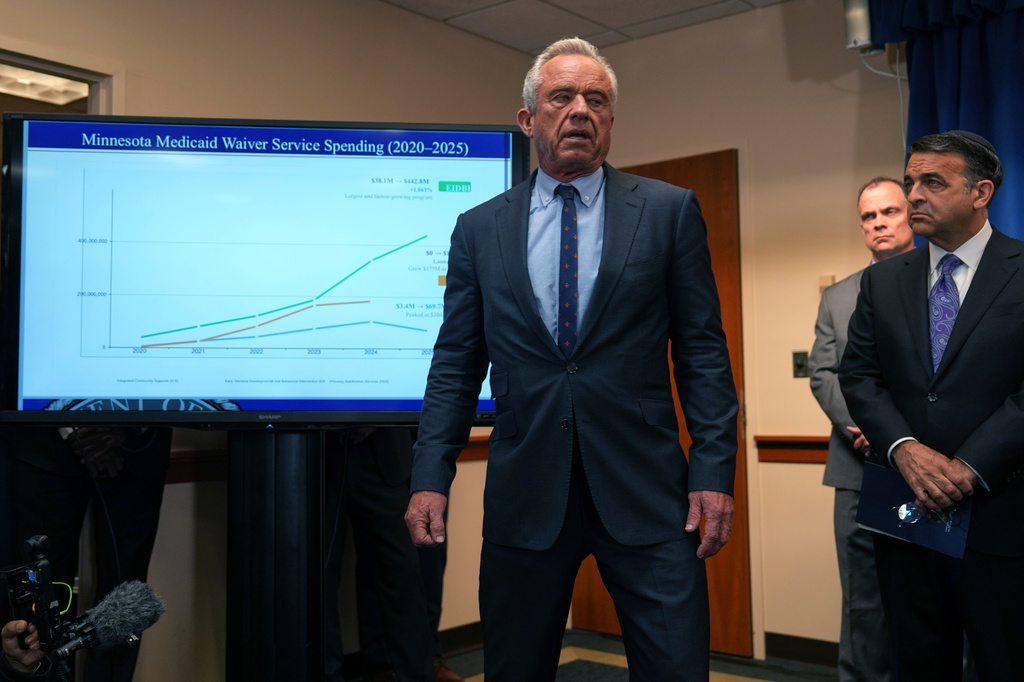 Health and Human Services Secretary Robert F. Kennedy Jr. speaks as US. Attorney Daniel Rosen listens, at right, during a press conference Thursday, May 21, 2026, in Minneapolis. (AP Photo/Glen Stubbe)