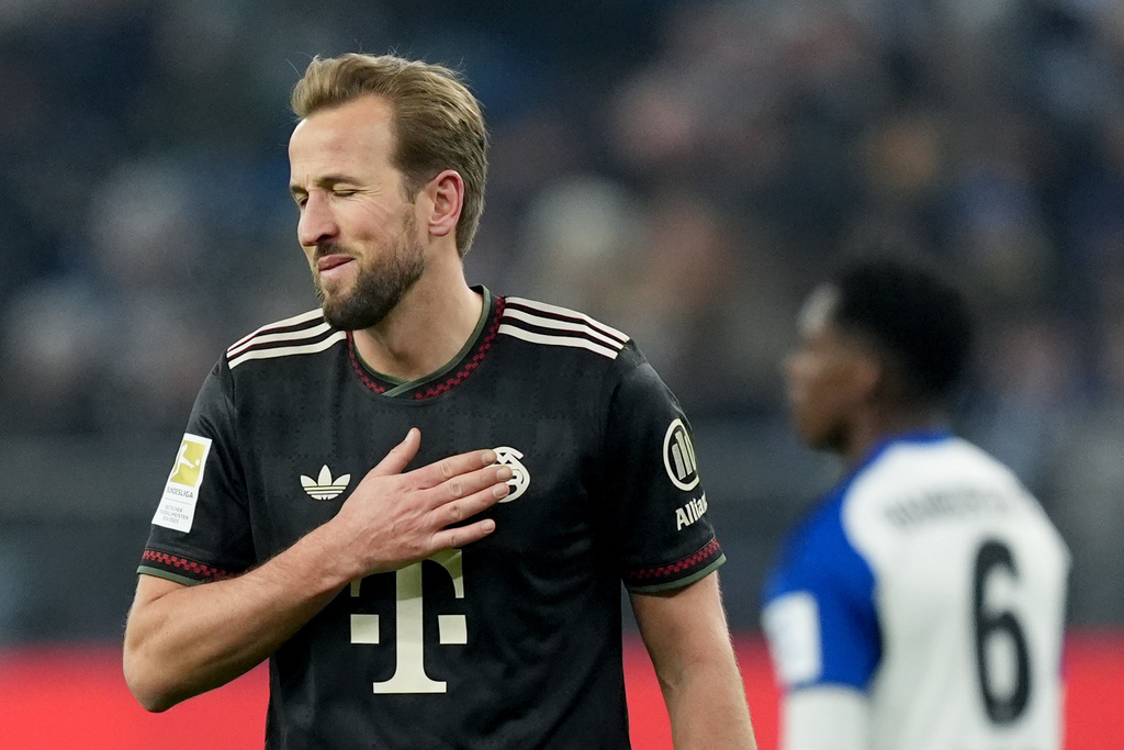 Munich's scorer Harry Kane reacts during the German Bundesliga soccer match between Hamburger SV and FC Bayern Munich in Hamburg, Germany, Saturday, Jan. 31, 2026. (Marcus Brandt/dpa via AP)