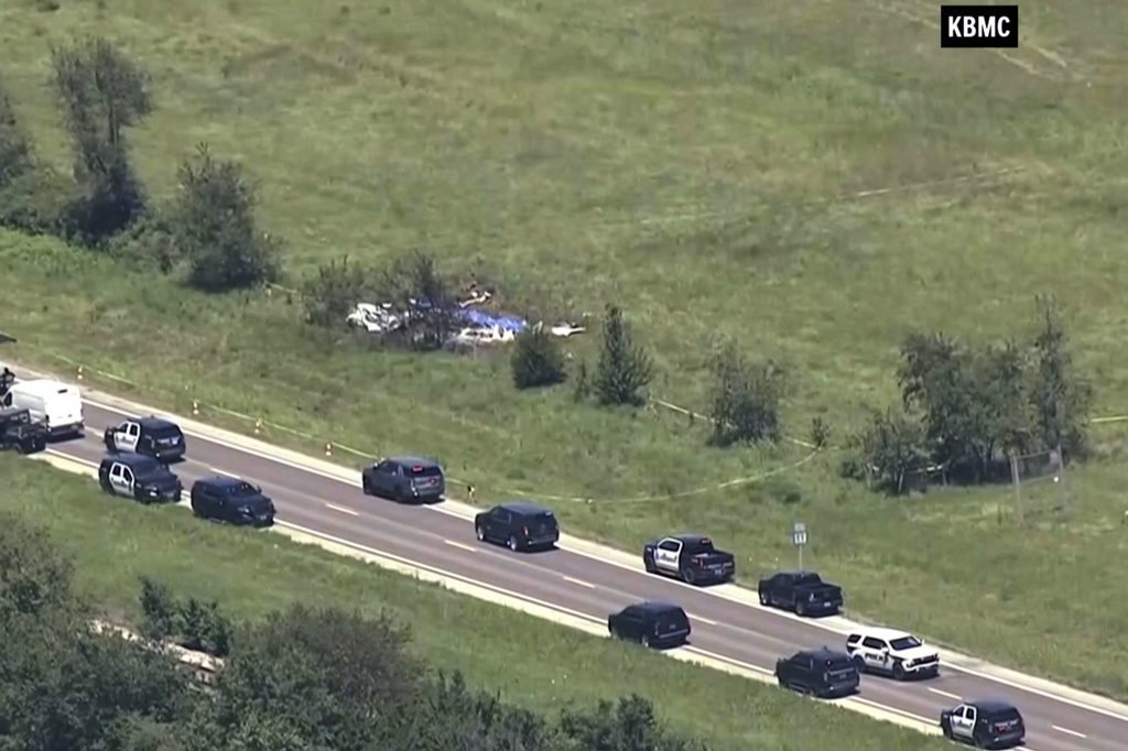 This video frame grab provided by KMBC-TV shows an aerial view of the crash scene near the Butler Memorial Airport in Butler, Mo., Sunday, June 14, 2026. (KMBC-TV via AP)