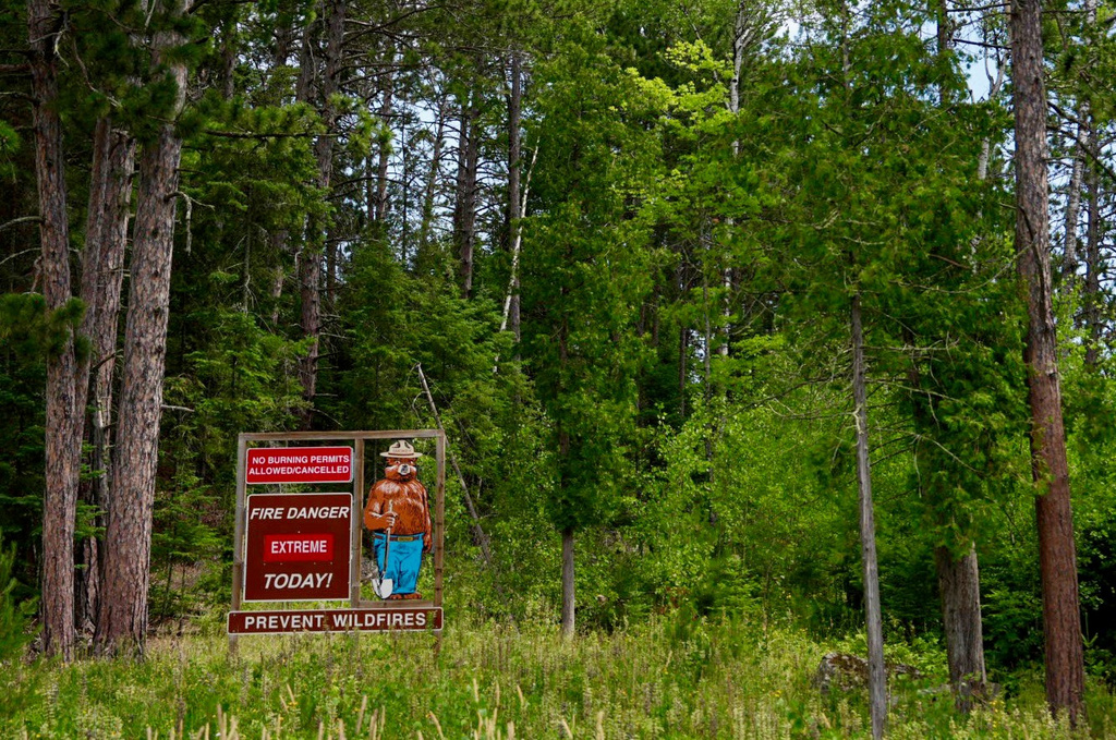Signage near the Minnesota Department of Natural Resources' office in Tower, Minn., notes extreme fire danger ,Tuesday, July 14, 2026. (Anthony Soufflé/Minnesota Star Tribune via AP)