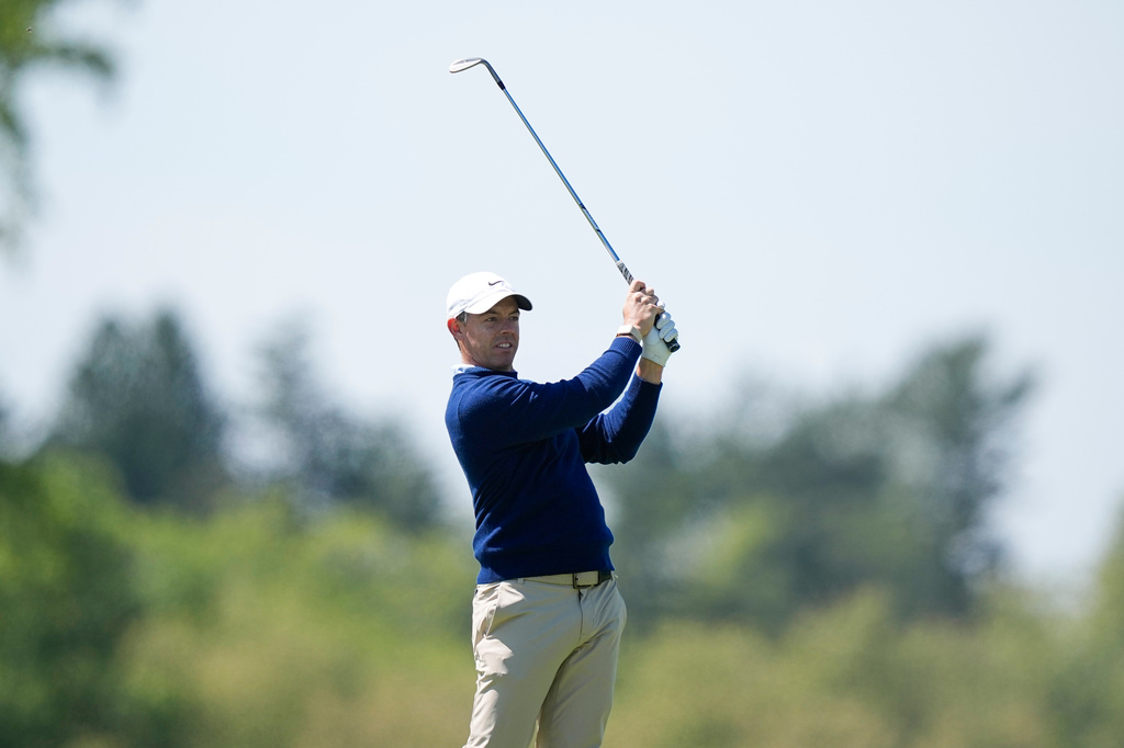Rory McIlroy, of Northern Ireland, hits from the third fairway during a PGA Championship golf tournament practice round at Aronimink Golf Club, Tuesday, May 12, 2026, in Newtown Square, PA. (AP Photo/Matt Slocum)