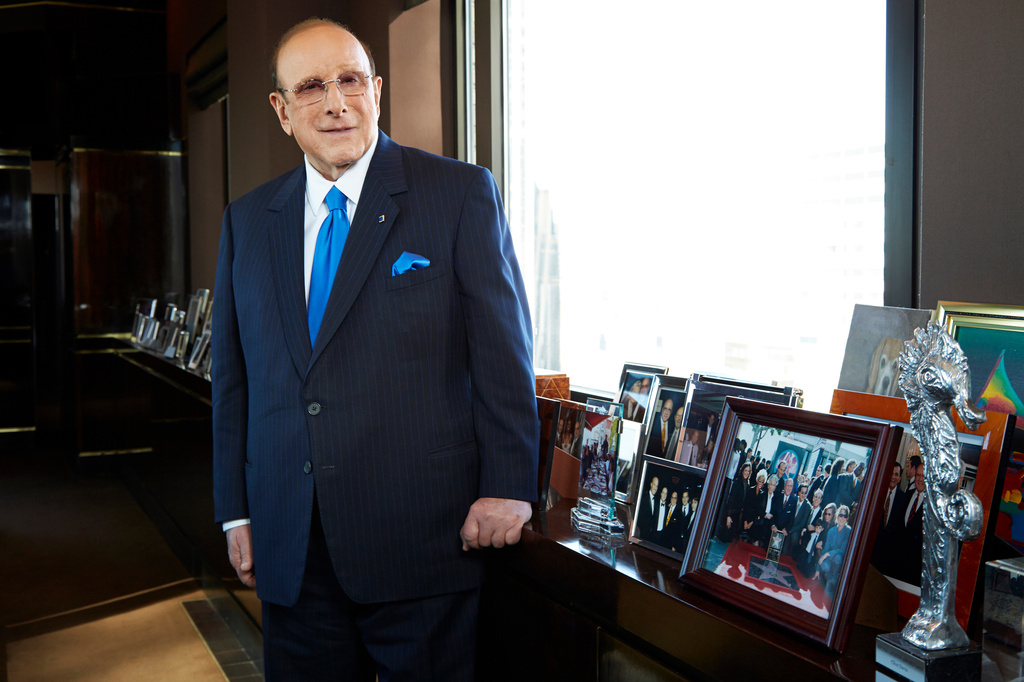 FILE - Sony Music Entertainment's Chief Creative Officer and famous hitmaker Clive Davis posing for a portrait in his office in New York on Feb. 18, 2013. (Photo by Dan Hallman/Invision/AP, File)