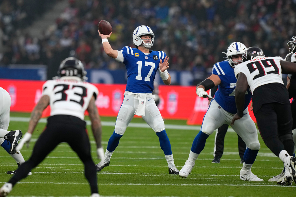 Indianapolis Colts quarterback Daniel Jones (17) throws a pass during the first half of an NFL football game against the Atlanta Falcons, Sunday, Nov. 9, 2025, in Berlin, Germany. (AP Photo/Martin Meissner)