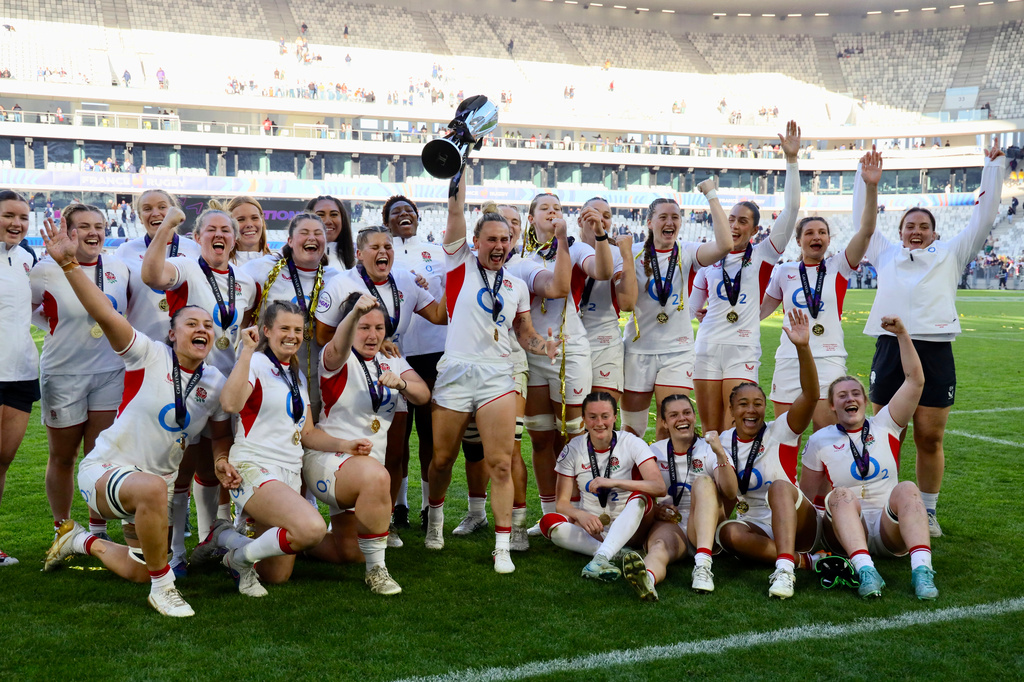 England's captain Megan Jones holds the trophy after aloft after her team won the Six Nations rugby union match between France and England in Bordeaux, Sunday, May 17, 2026. (AP Photo/Yohan Bonnet)