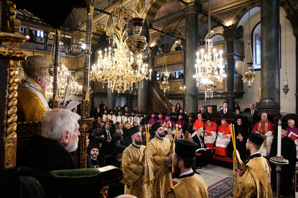 Pope Leo XIV celebrates a Divine Liturgy led by Ecumenical Patriarch Bartholomew I, the spiritual leader of the world's Eastern Orthodox Christians at the Patriarchal Church of Saint George, in Istanbul, Turkey, Sunday, Nov. 30, 2025. (AP Photo/Emrah Gurel)