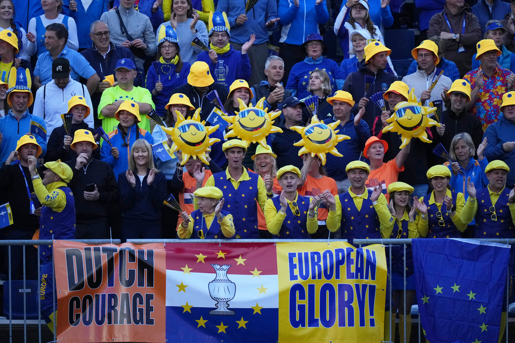 Spectators react ahead of play at the Solheim Cup at the Bernardus Golf course in Den Bosch, Netherlands, Friday, Sept. 11, 2026. (AP Photo/Alastair Grant)