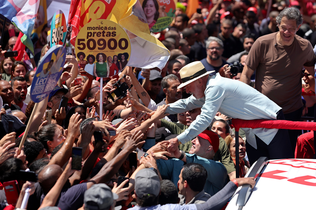 Brazilian President Luiz Inacio Lula da Silva, who is running for reelection, greets supporters during a campaign rally in Sao Paulo, Brazil, Saturday, Sept. 26, 2026. (AP Photo/Allison Sales)