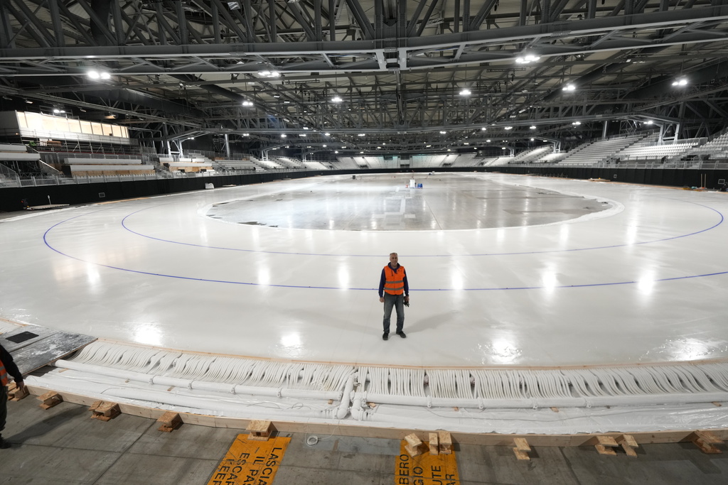 Ice Master Mark Messer poses in the stadium where speed skating discipline of the Milan Cortina 2026 Winter Olympics will take place, in Rho, outskirt of Milan, Tuesday, Nov. 11, 2025. (AP Photo/Luca Bruno)