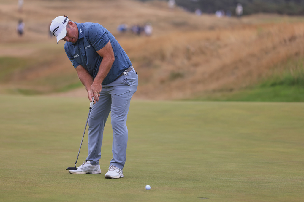 Ryan Fox of New Zealand putts on the 10th green during the third day of the British Open Golf championships at Royal Birkdale golf club, in Southport, England, Saturday, July 18, 2026. (AP Photo/Peter Morrison)