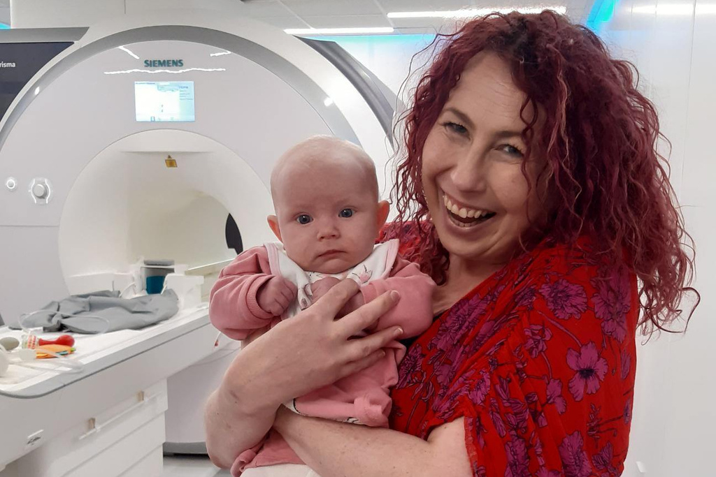 In this undated photo, baby Blaise attends her 2-month Foundcog scan with her mother Mary at Trinity College Institute of Neuroscience in Dublin, Ireland. (Cusack Lab via AP)