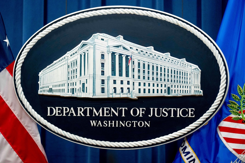 FILE - The Justice Department sign is shown in Washington, Nov. 18, 2022. (AP Photo/Andrew Harnik, File)