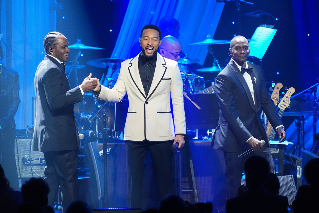 Pusha T, from left, John Legend, and Malice on stage during the Pre-Grammy Gala on Saturday, Jan. 31, 2026, at the Beverly Hilton Hotel in Beverly Hills, Calif. (AP Photo/Chris Pizzello)