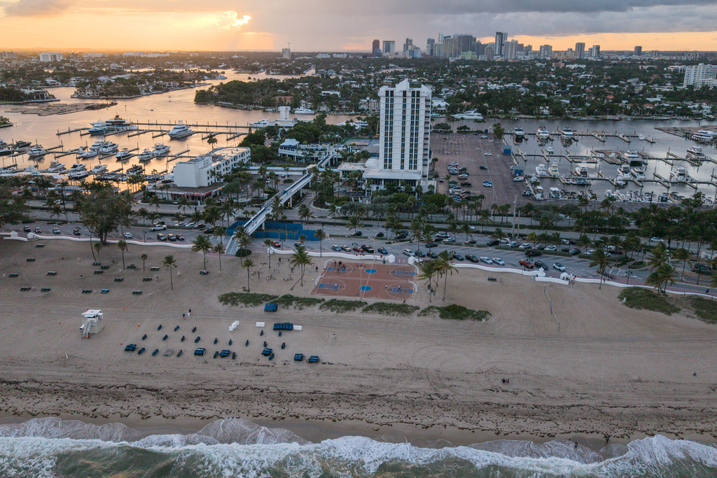 In this aerial view basketball courts are seen at Fort Lauderdale Beach Park, the site of proposed pickleball courts as part of a new luxury development, Oct. 8, 2025, in Fort Lauderdale, Fla. (AP Photo/Daniel Kozin)