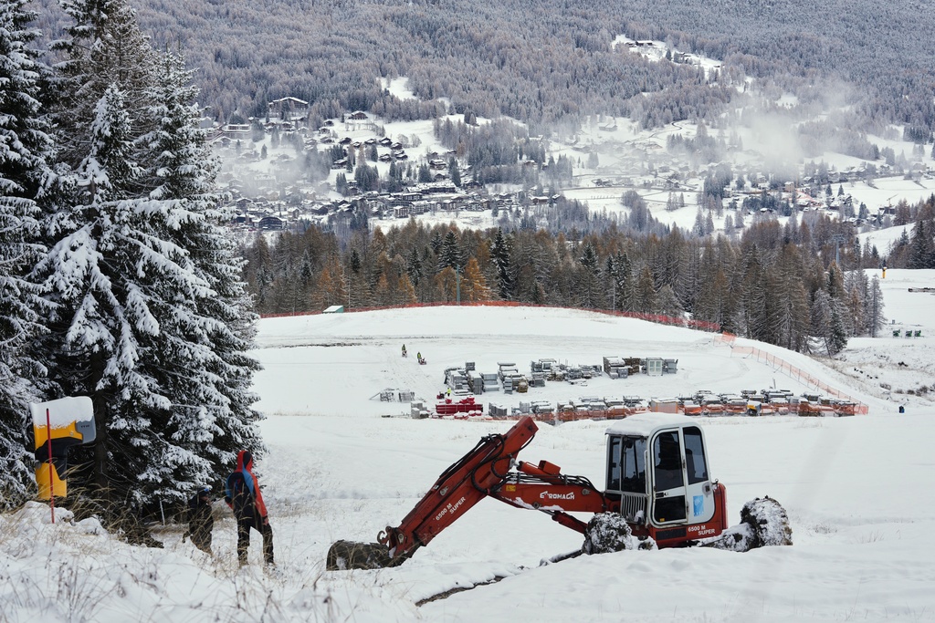 A view of the work along the Olympia delle Tofane course where the women's Alpine skiing will be contested at the 2026 Milan Cortina Winter Olympics, in Cortina D'Ampezzo, Italy, Friday, Nov. 21, 2025. (AP Photo/Andrew Medichini)