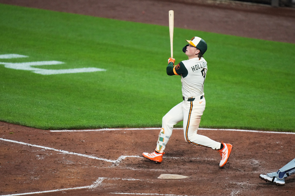 Baltimore Orioles' Jackson Holliday (7) hits a two-run home run during the fourth inning of a baseball game against the Detroit Tigers, Friday, May 22, 2026, in Baltimore. (AP Photo/Stephanie Scarbrough)