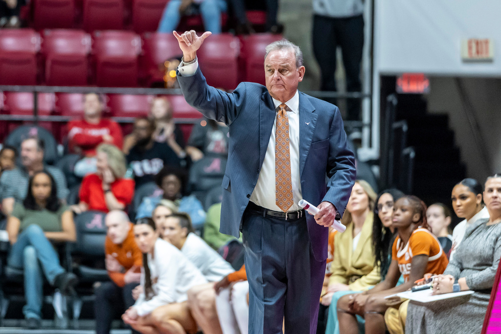 Texas head coach Vic Schaefer signals to his players during the first half of an NCAA college basketball game against Alabama Sunday, March 1, 2026, in Tuscaloosa, Ala. (AP Photo/Vasha Hunt)