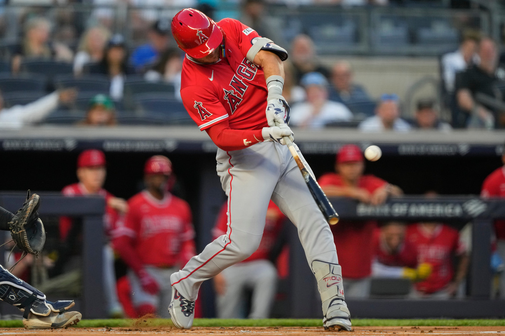 Los Angeles Angels' Mike Trout (27) hits a home run during the first inning of a baseball game against the New York Yankees, Tuesday, April 14, 2026, in New York. (AP Photo/Yuki Iwamura)