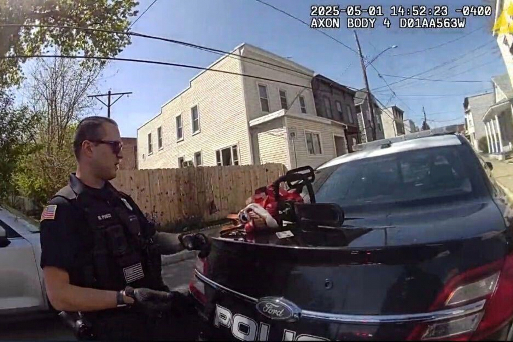 This image taken from body camera footage provided by Cohoes Police Department, N.Y., shows a chainsaw and clown mask, May 1, 2025, in Cohoes, N.Y. (Cohoes Police Department, NY via AP)
