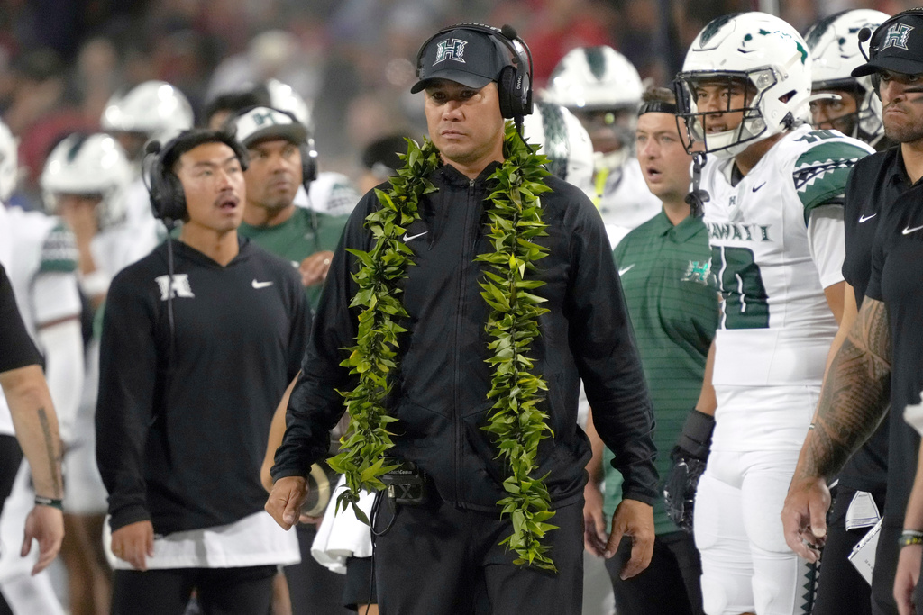 FILE - Hawaii head coach Timmy Chang in the first half during an NCAA football game against Arizona on Saturday, Aug. 30, 2025, in Tucson, Ariz. (AP Photo/Rick Scuteri, file)