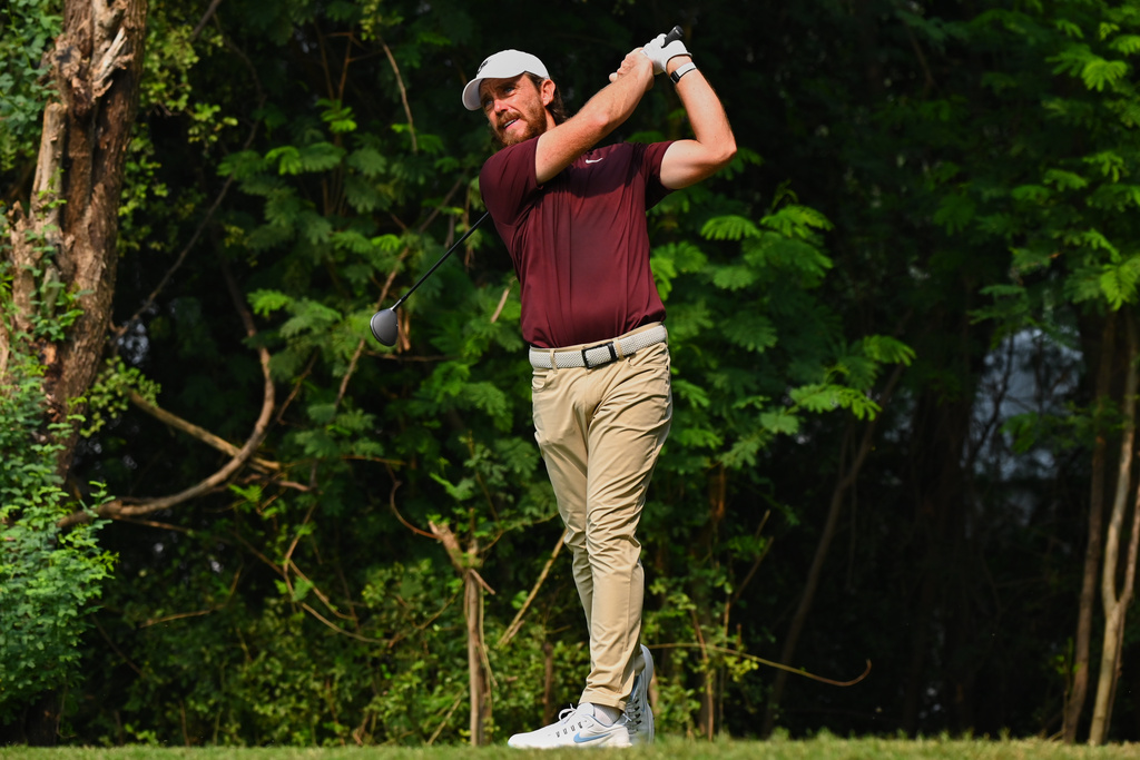 Tommy Fleetwood of England plays a shot during the DP World Tour Championship golf tournament in New Delhi, India, Saturday, Oct.18, 2025. (AP Photo/Dharam Diwakar)