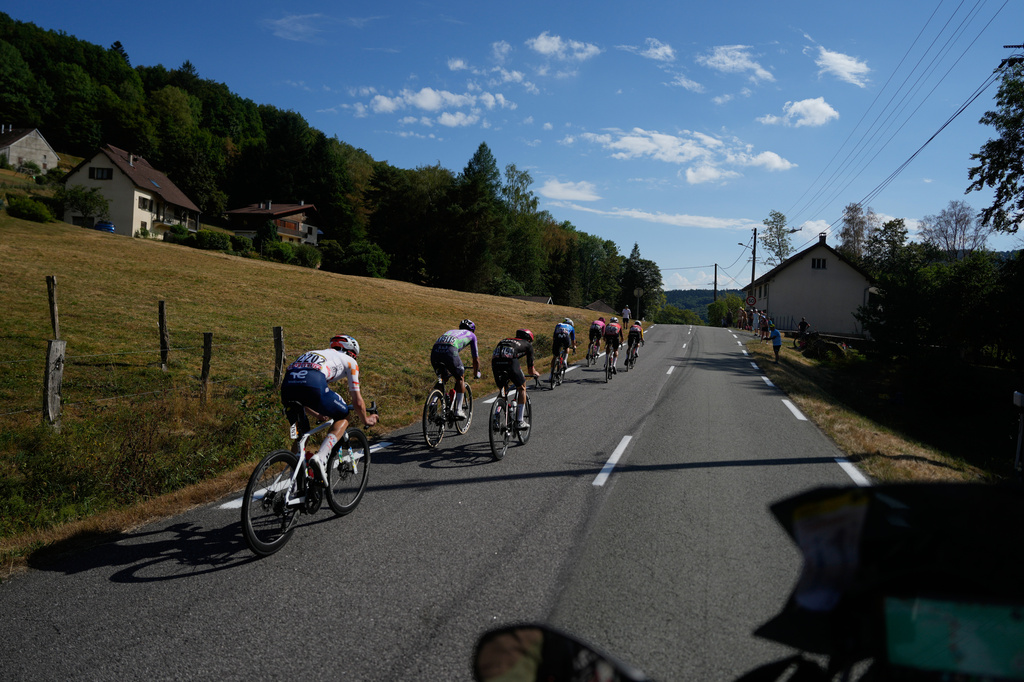 The breakaway rides during the thirteenth stage of the Tour de France cycling race with start in Dole and finish in Belfort, France, Friday, July 17, 2026. (AP Photo/Mosa'ab Elshamy)