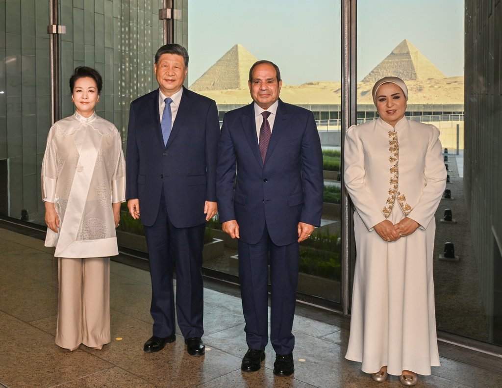 In this photo released by Xinhua News Agency, Chinese President Xi Jinping, second left, and his wife Peng Liyuan, left, pose with Egyptian President Abdel-Fattah el-Sissi and first lady Entissar el-Sissi as they visit the Grand Egyptian Museum in Giza, Egypt on Wednesday, Sept. 2, 2026. (Xie Huanchi/Xinhua via AP)