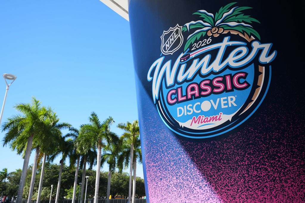 A sign for the upcoming NHL Winter Classic hockey game between the Florida Panthers and New York Rangers is posted at loanDepot Park in Miami. (AP Photo/Lynne Sladky)