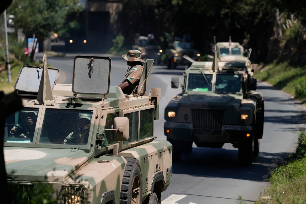 South African National Defense Forces deploy in the Riverlea township of Johannesburg, South Africa, Wednesday, March 11, 2026. (AP Photo/Themba Hadebe)