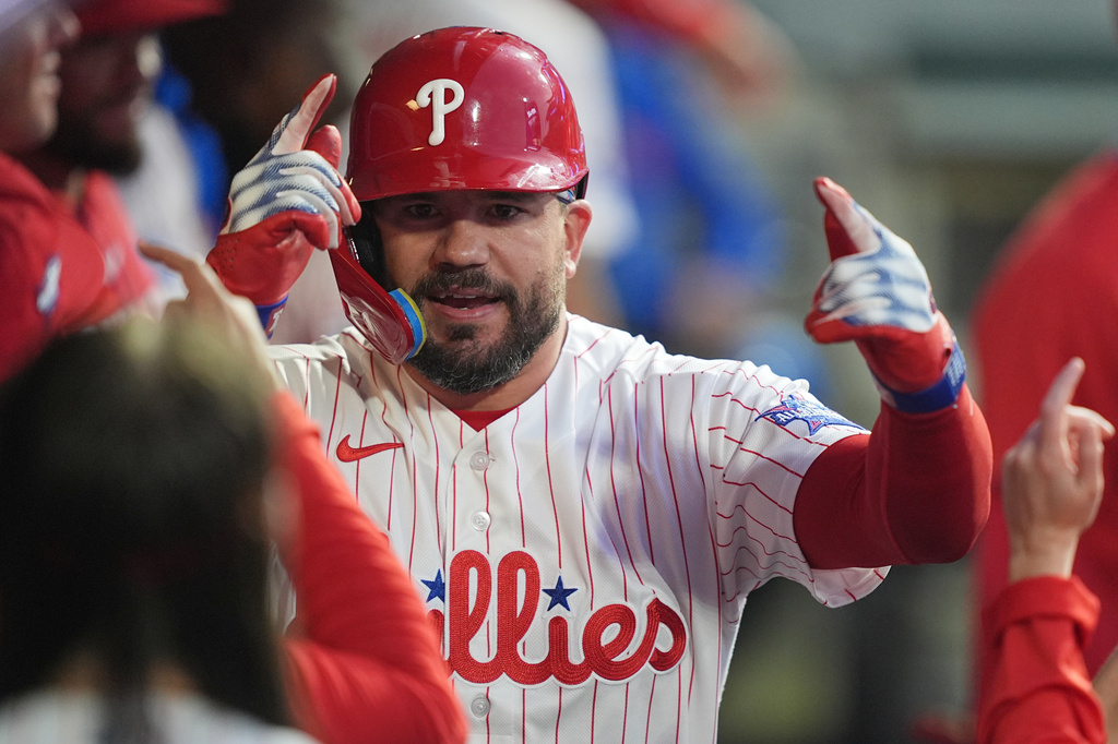 Philadelphia Phillies' Kyle Schwarber celebrates after hitting a home run off of Washington Nationals pitcher Zack Littell during the third inning of a baseball game, Tuesday, March 31, 2026, in Philadelphia. (AP Photo/Matt Rourke)