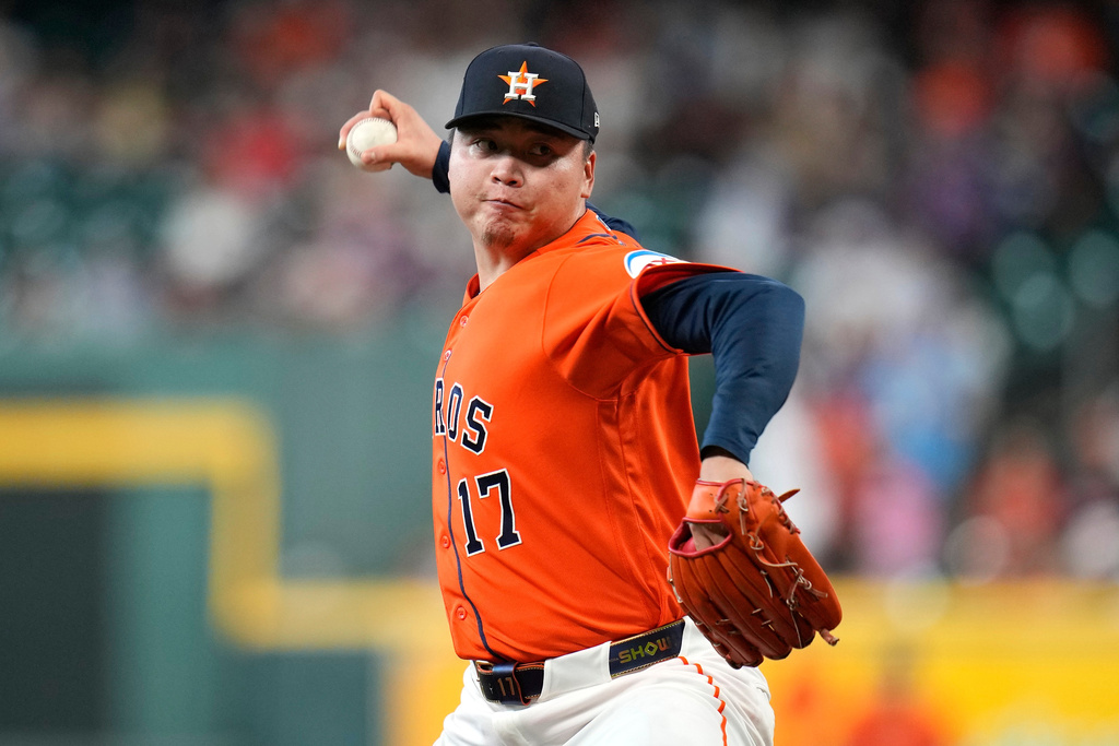 Houston Astros starting pitcher Kai-Wei Teng delivers to Milwaukee Brewers' Christian Yelich during the first inning of a baseball game, Friday, May 29, 2026, in Houston. (AP Photo/Karen Warren)