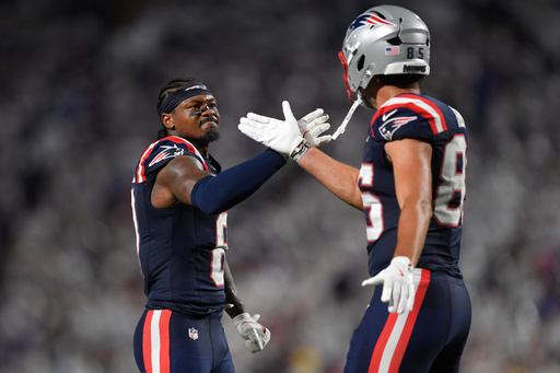 New England Patriots wide receiver Stefon Diggs, left, and New England Patriots tight end Hunter Henry, right, celebrate a play against the Buffalo Bills during the second half of an NFL football game, Sunday, Sept. 5, 2025, in Orchard Park, N.Y. (AP Photo/Adrian Kraus) New England Patriots wide receiver Stefon Diggs, left, and New England Patriots tight end Hunter Henry, right, celebrate a play against the Buffalo Bills during the second half of an NFL football game, Sunday, Sept. 5, 2025, in Orchard Park, N.Y. (AP Photo/Adrian Kraus)