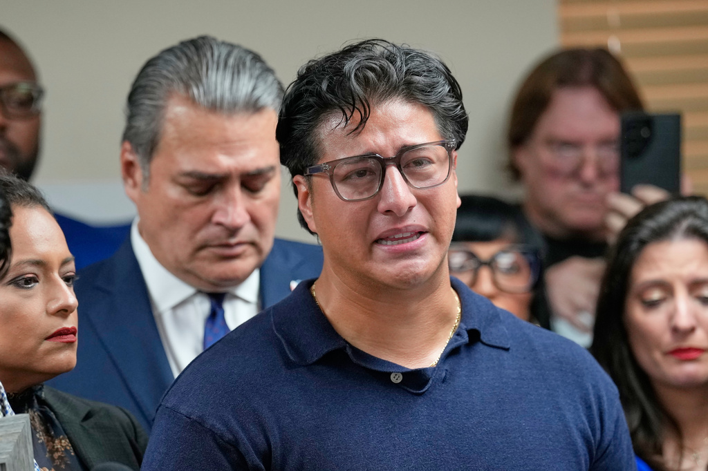 Ronaldo Salgado, son of Lorenzo Salgado Araujo, speaks during a news conference Wednesday, July 8, 2026, in Houston. (AP Photo/David J. Phillip)