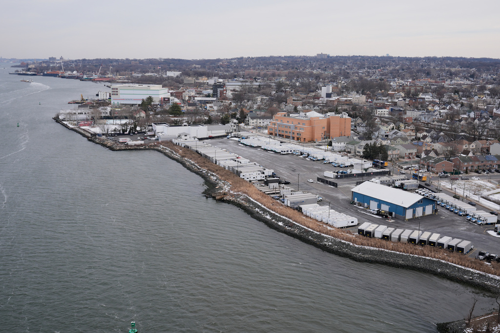 The coast of Staten Island is seen in New York, Friday, Jan. 23, 2026. (AP Photo/Seth Wenig)