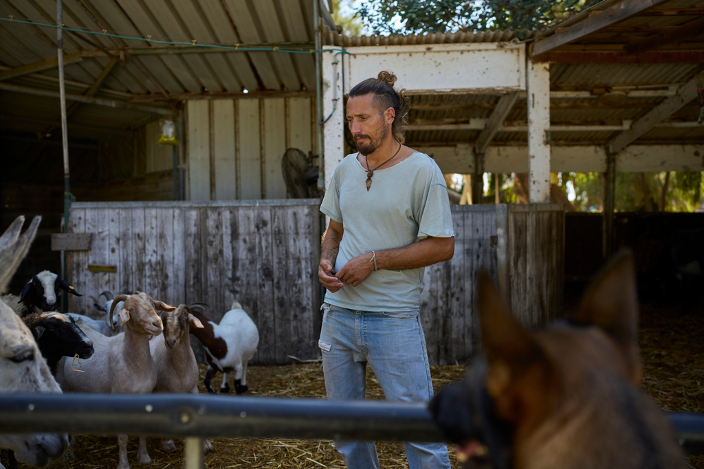 Assi Nave, founder of Back2Life, stands in the farm in Kibbutz Sdot Yam, Israel, on Oct. 16, 2025. The group helps soldiers combat mental health problems by working with animals. (AP Photo/Ohad Zwigenberg)