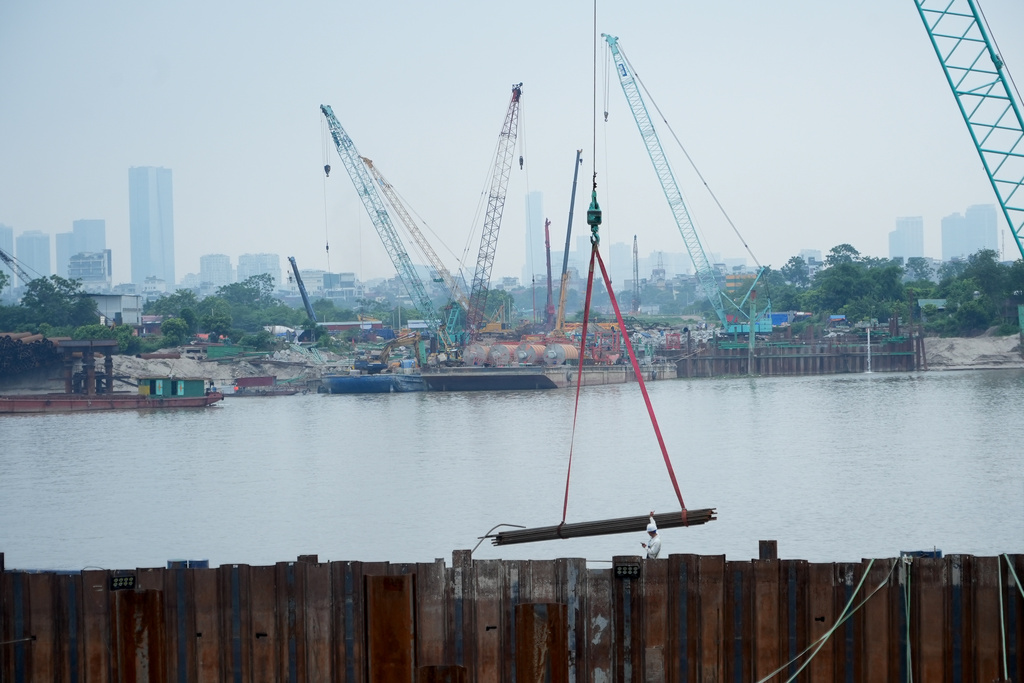 The construction site of a new bridge crossing the Red river is seen in Hanoi, Vietnam, Thursday, June 11, 2026. (AP Photo/Hau Dinh)