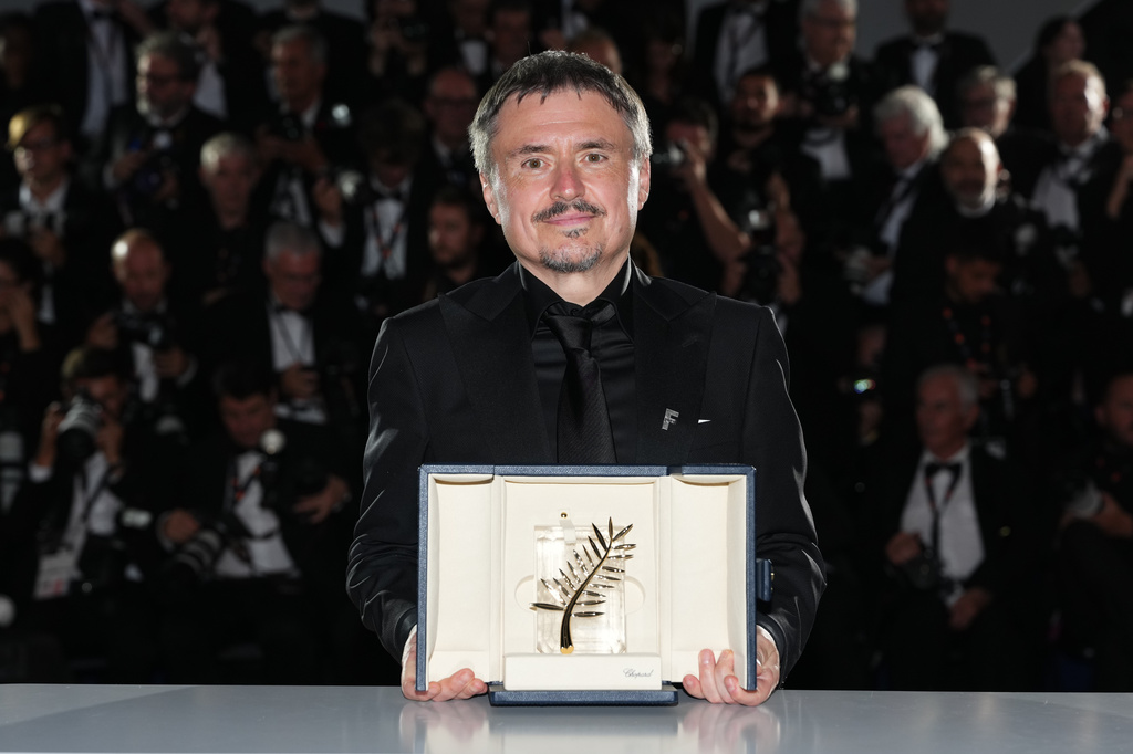 Cristian Mungiu, winner of the Palme d'Or for 'Fjord,' poses for photographers at the awards ceremony photo call during the 79th international film festival, Cannes, southern France, Saturday, May 23, 2026. (Photo by Scott A Garfitt/Invision/AP)